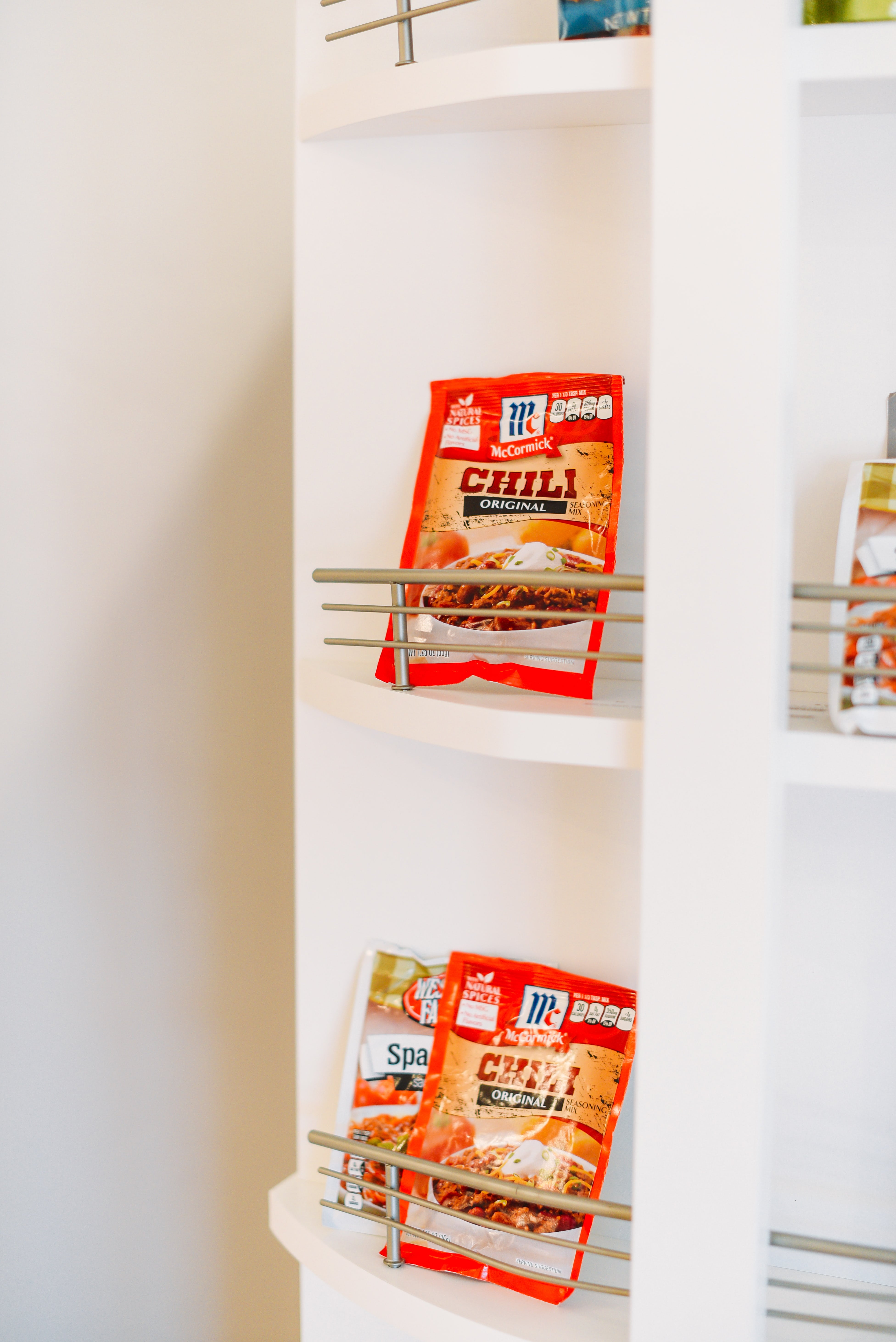 Custom closet systems for luxury homes – rotating organizer installed