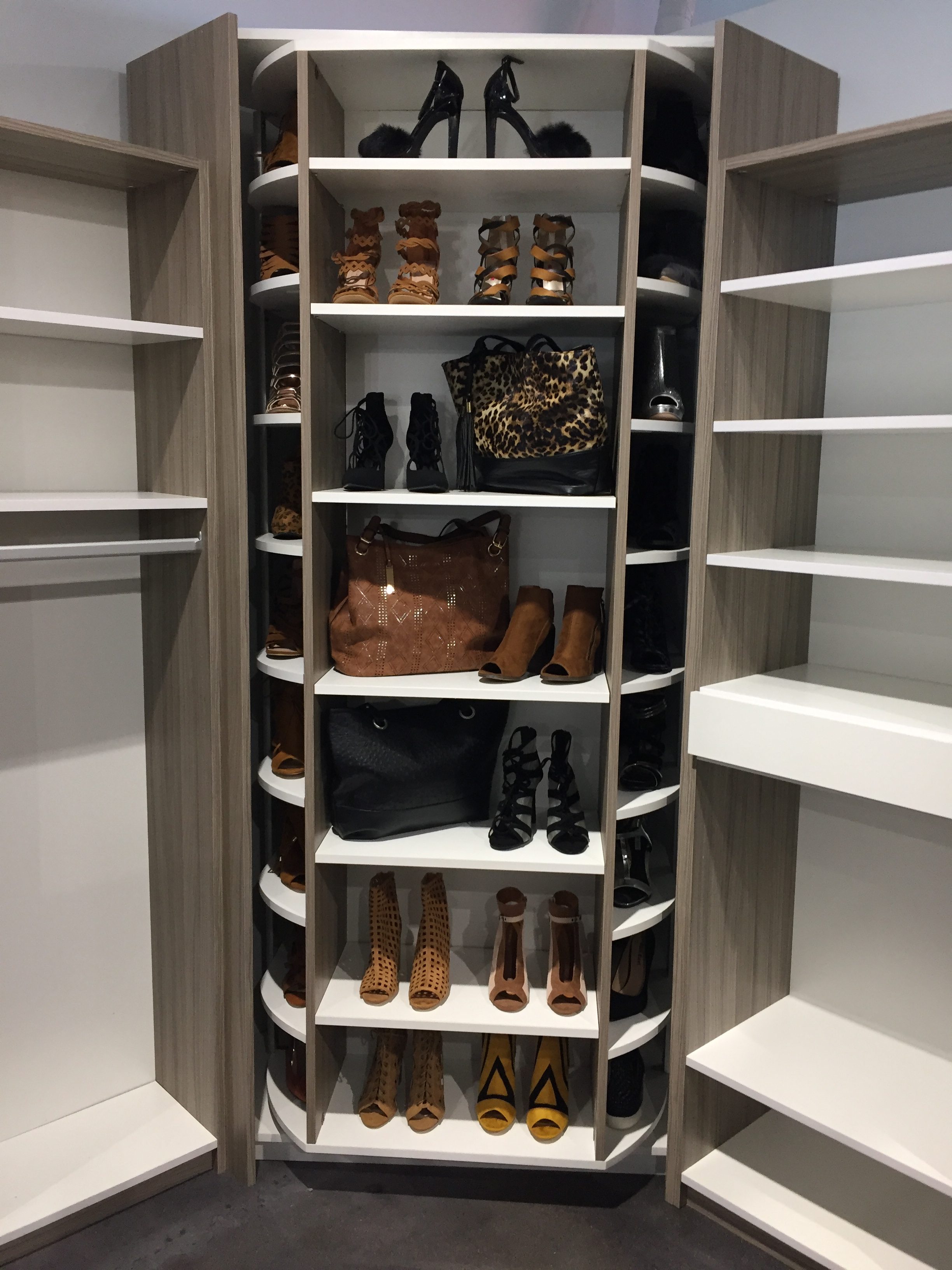 Automated wardrobe organizer with tactile closet finishes – shoe and bag storage